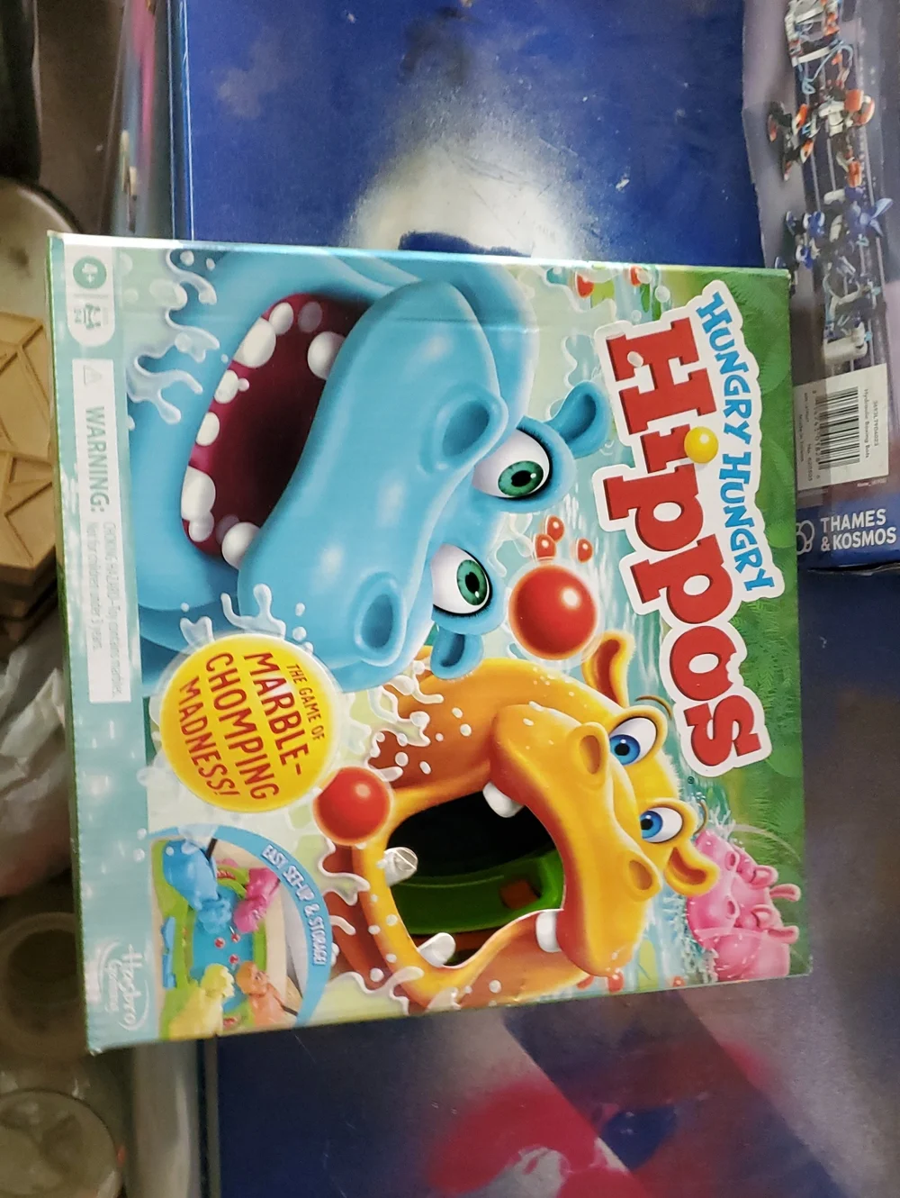 Hasbro Hungry Hungry Hippos Game - Blue, Yellow, Pink Hippos on Box